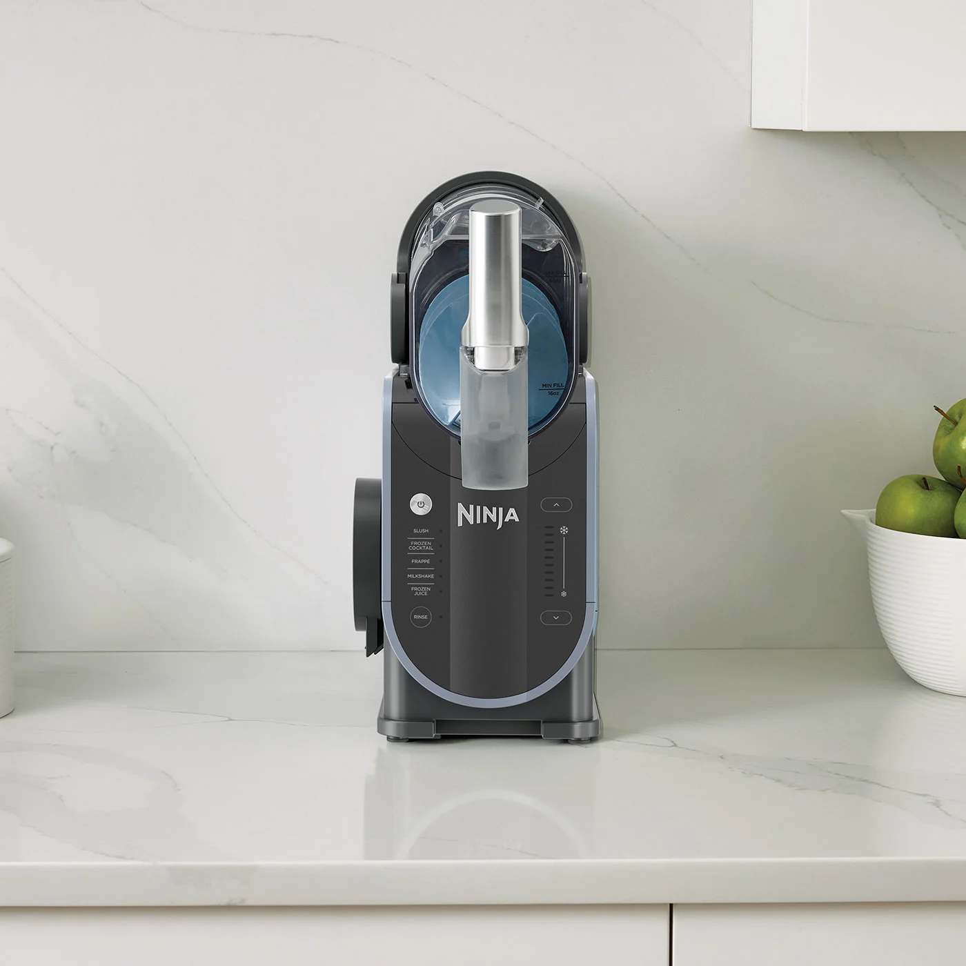 Ninja-FS301UK_InUse_Kitchen_OnCounter_Dispensing_Man_Strawberry_1_copy